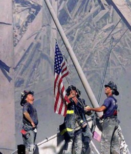 9-11-01 Firefighters_raising flag