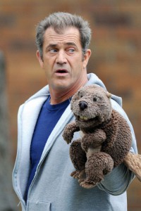 Mel Gibson with a beaver hand puppet filming The Beaver in NY