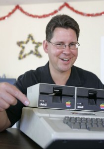 Richard Skrenta, pictured with an Apple II like the one he used to create the first computer virus.