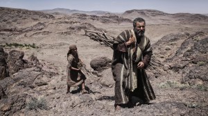 Mountain Moriah; Abraham (GARY OLIVER) prepares Isaac (HUGO ROSSI) for the sacrifice.