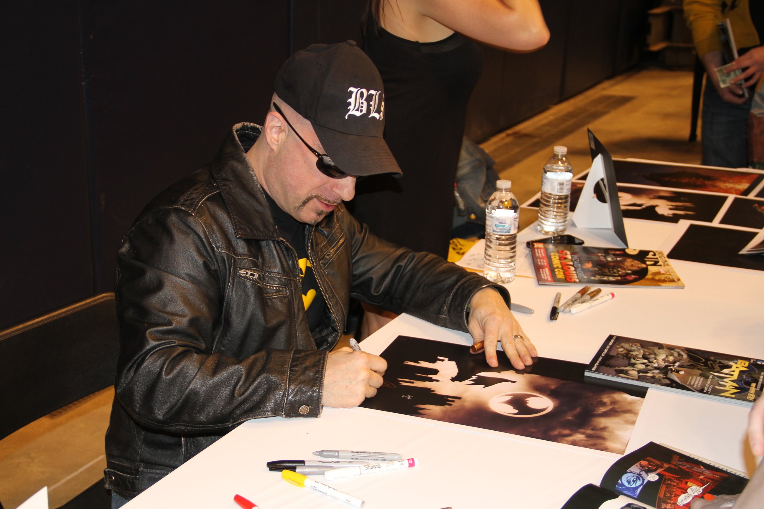 Greg Capullo, current artist on Batman (New 52), signing prints for fans. Photo Credit: Kevin Brackett